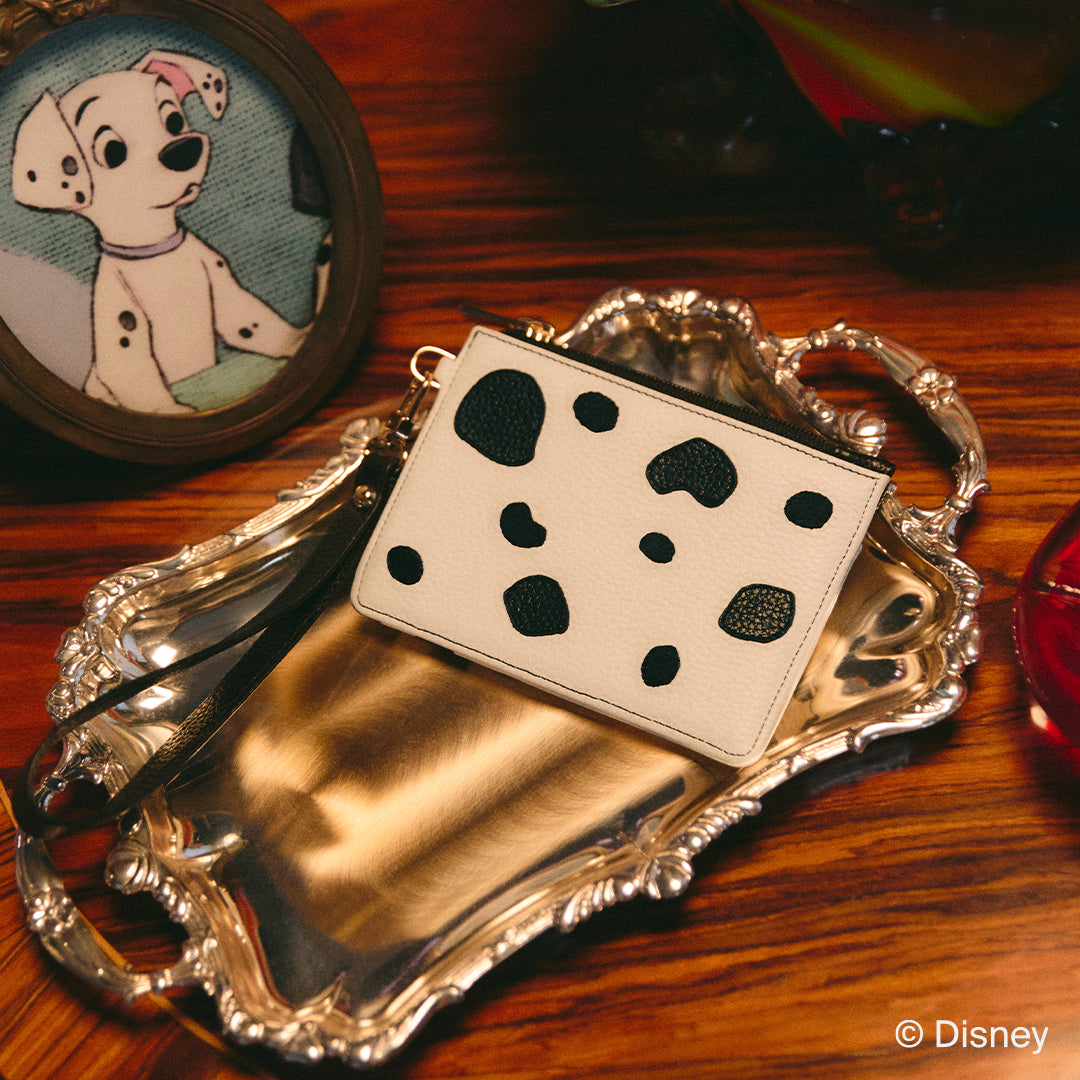 TARJETERO CON ASA 101 DALMATIANS HUESO