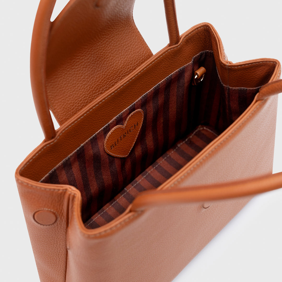 AMARA HANDLE BAG COBRE