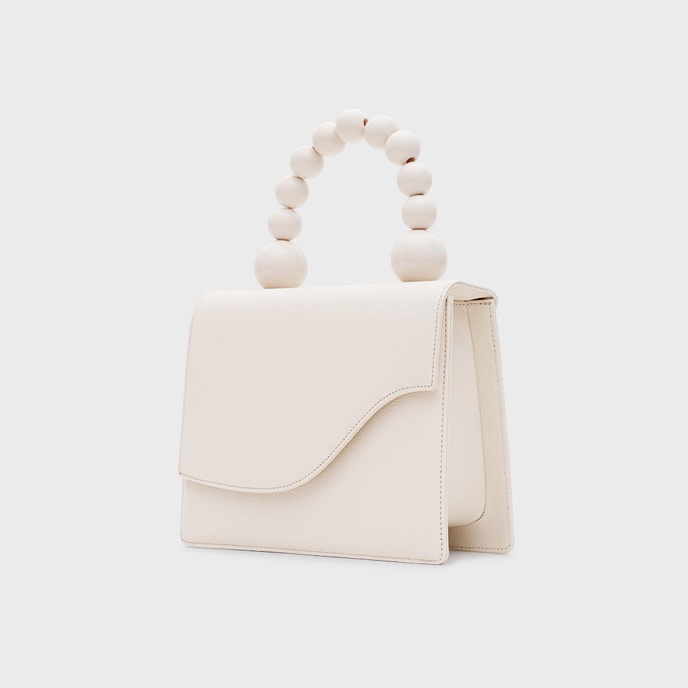 ARIA BEADED LUNCH BAG HUESO