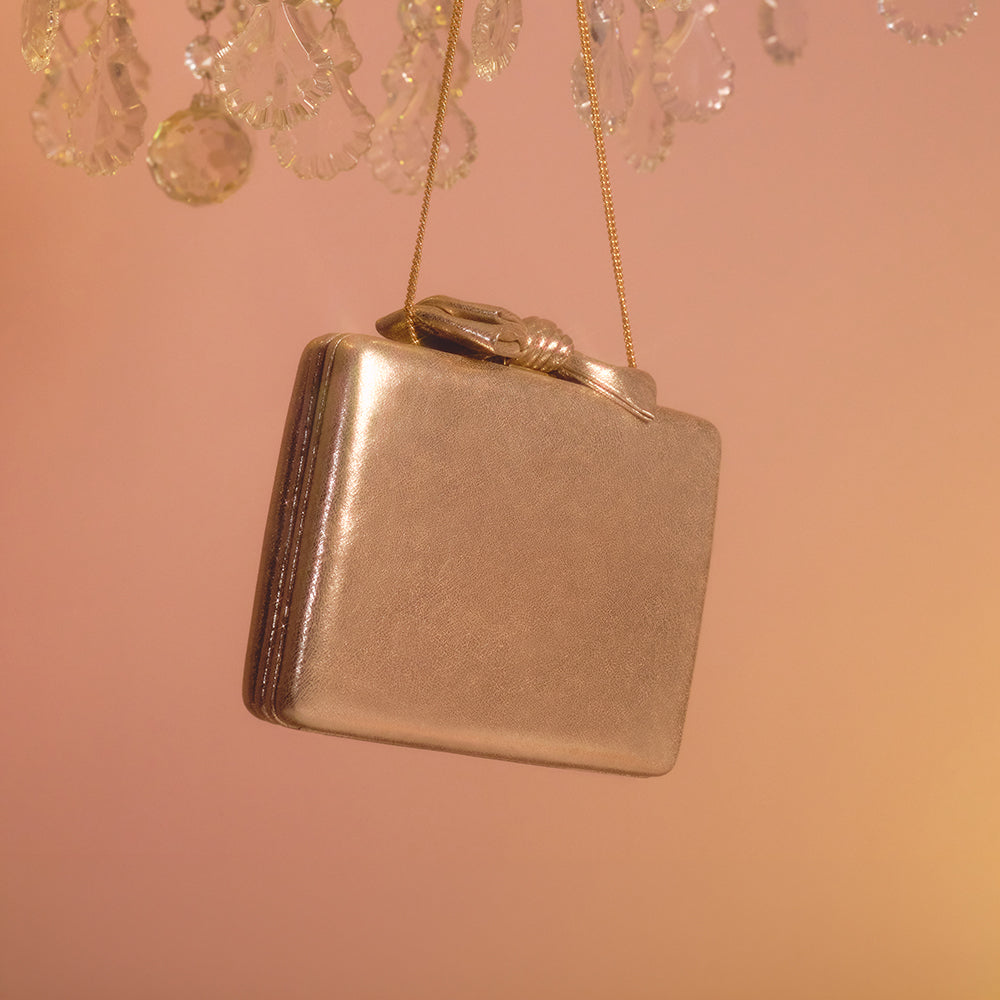 CLUTCH RAISA PLATINO ORO