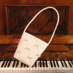 Cargue la imagen en el visor de la galería, MARIE MINI BOWS BUCKET BAG HUESO