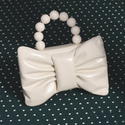 NAILA BEADED BOW BAG HUESO